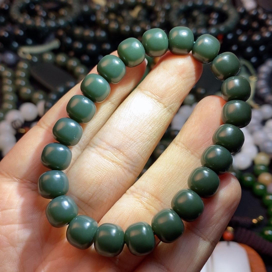 和田玉手串未镶嵌桃**人