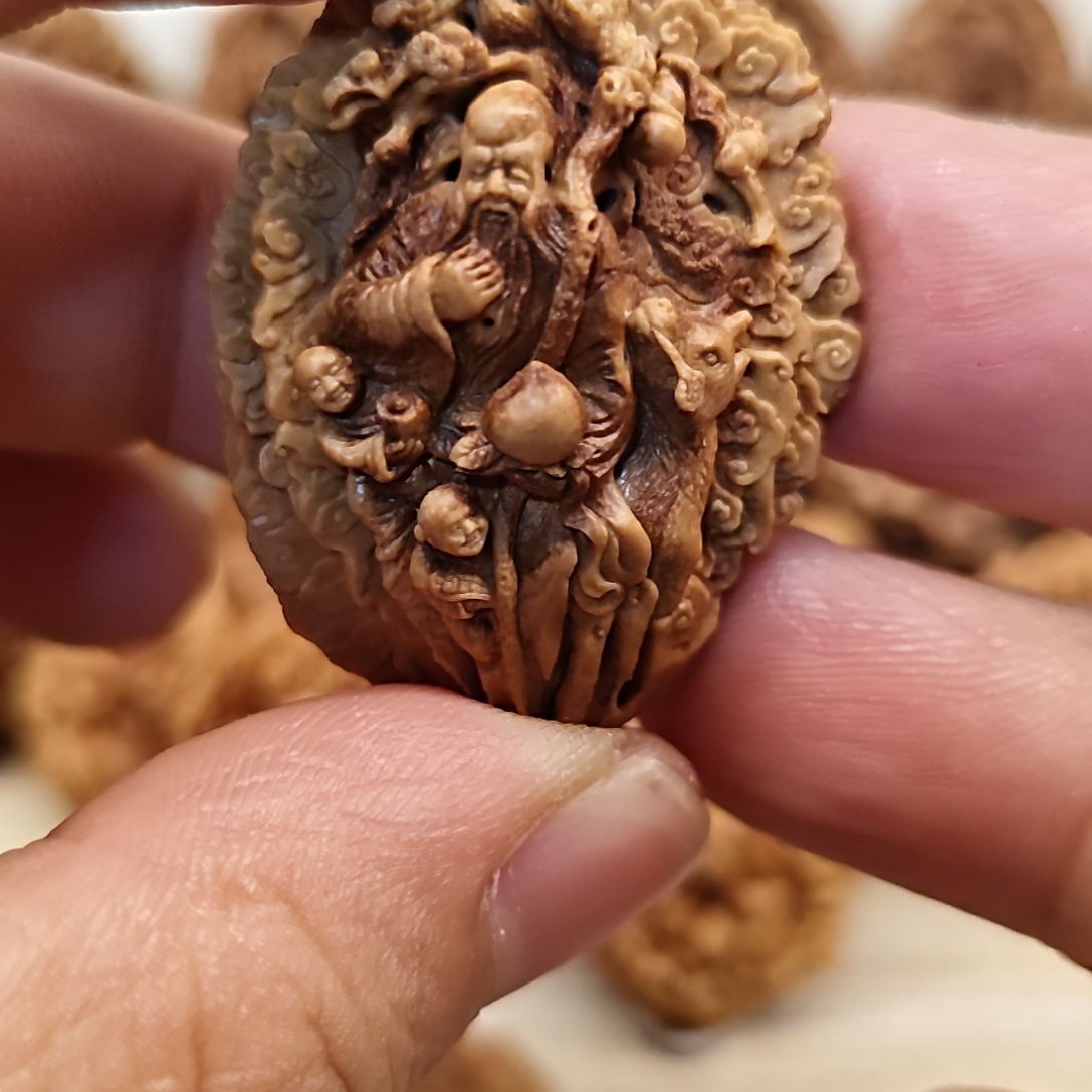 桃核纯手工雕刻寿星公
