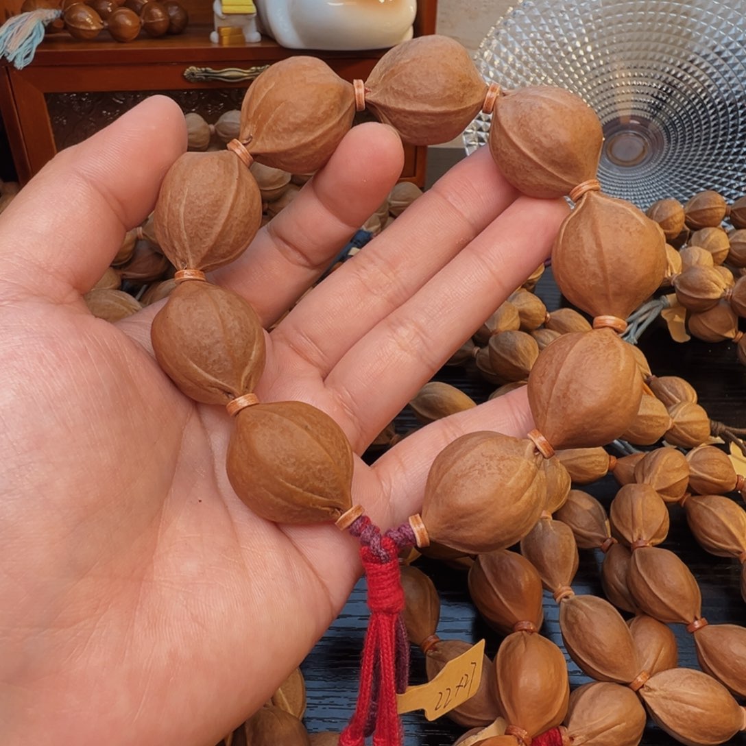 捷***商橄榄核手串梅林铁核22×27定制抛光不退不换