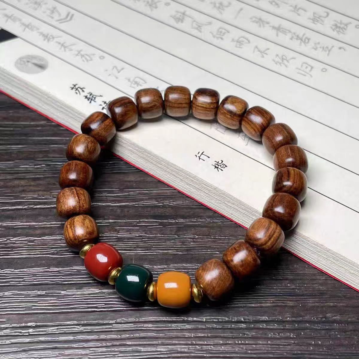 JS5黑花梨1.1*1.2cm老型红绿灯手串（多样性发货）