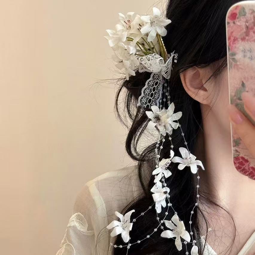 新中式古风仿真铃兰花朵发夹女森系氛围感超仙流苏侧边夹盘发头饰