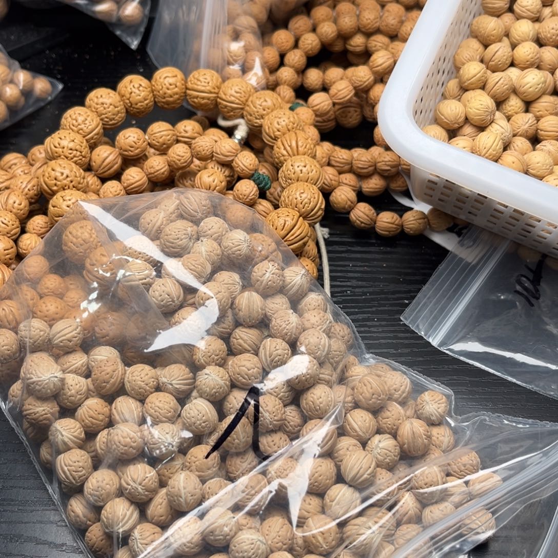 用***4文玩核桃手串小桃核散籽批发