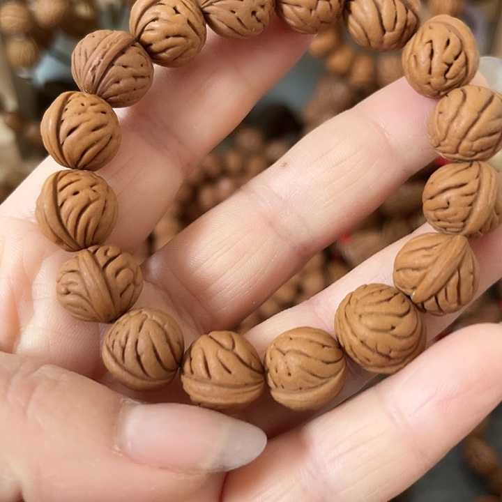 W***s核桃把件精品桃枭小籽手串