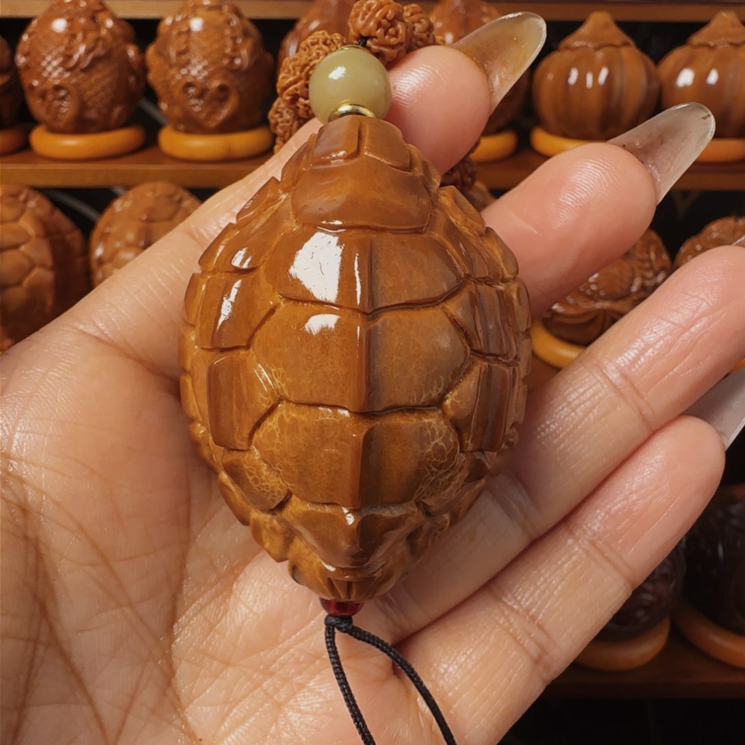 橄榄核把件西*富甲一方手把件42