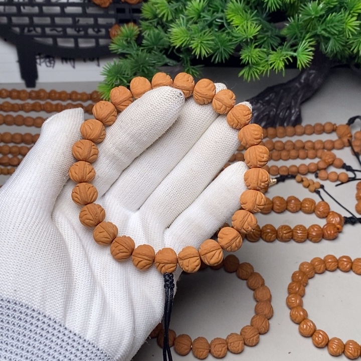 桃核手串凤羽手持