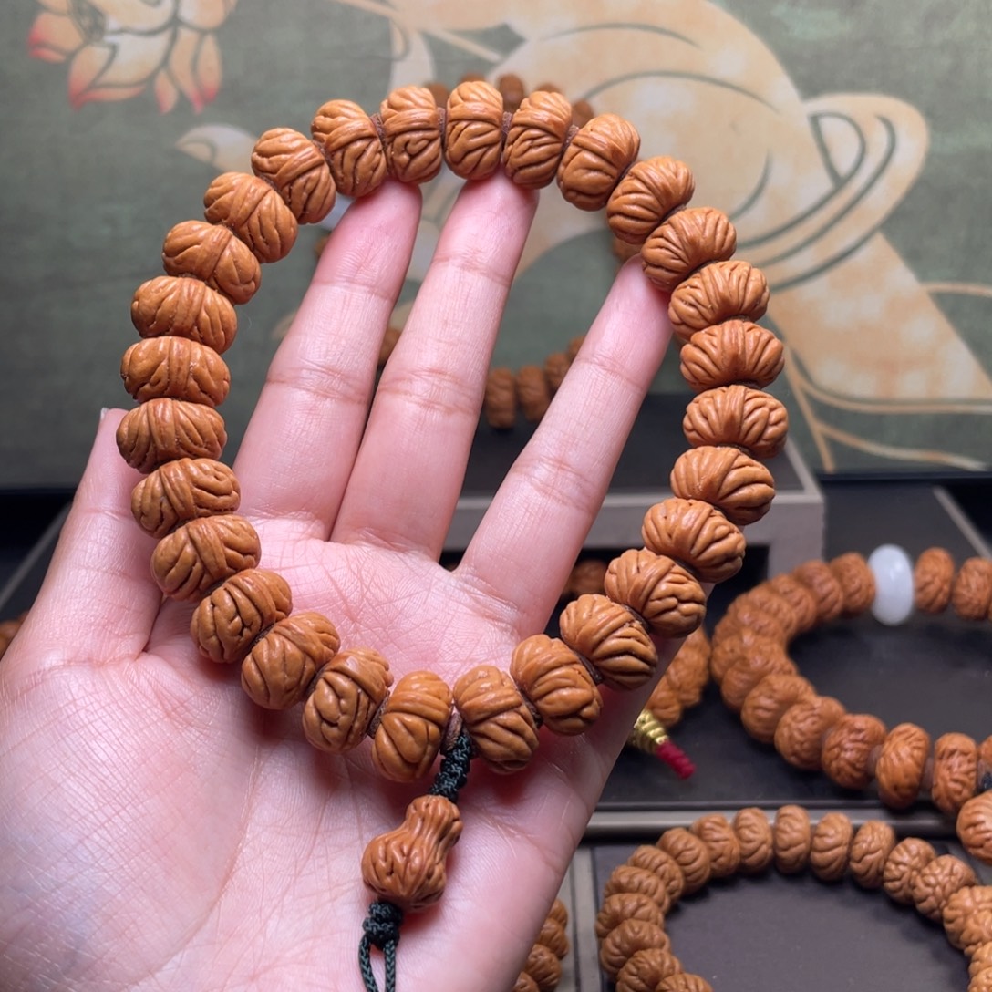 鉴***界桃核吊坠16祥云纽扣