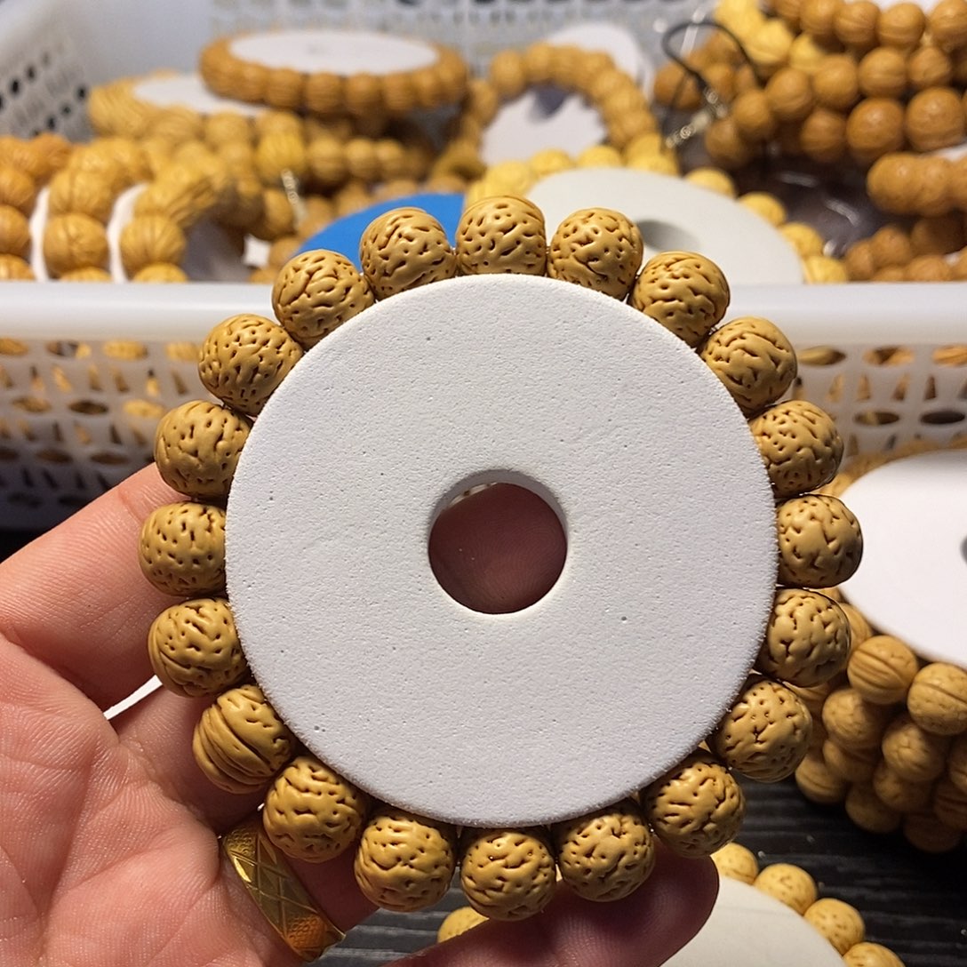 L***M吊坠桃核1.4野生桃核手串