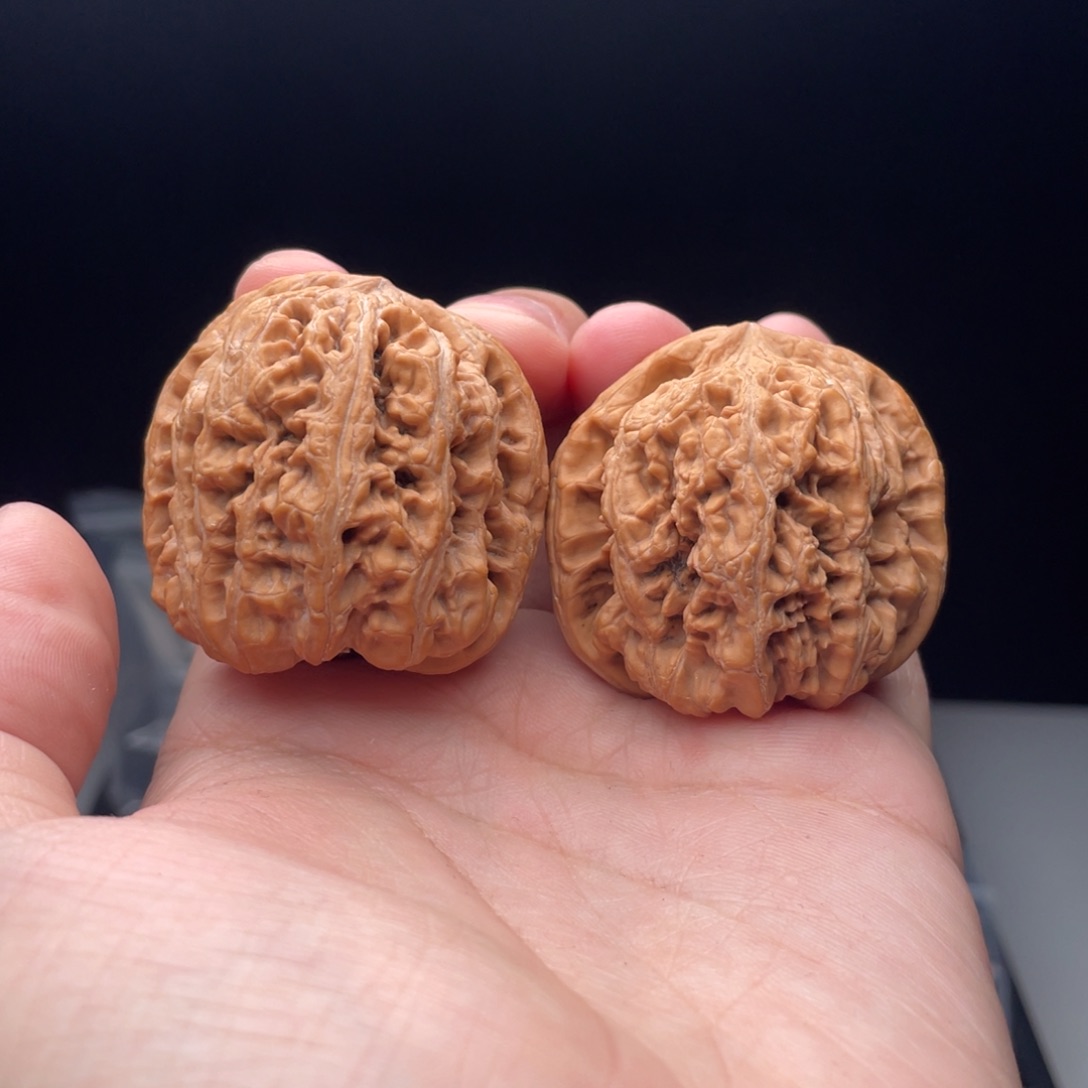 断***空桃核吊坠粗筋一对