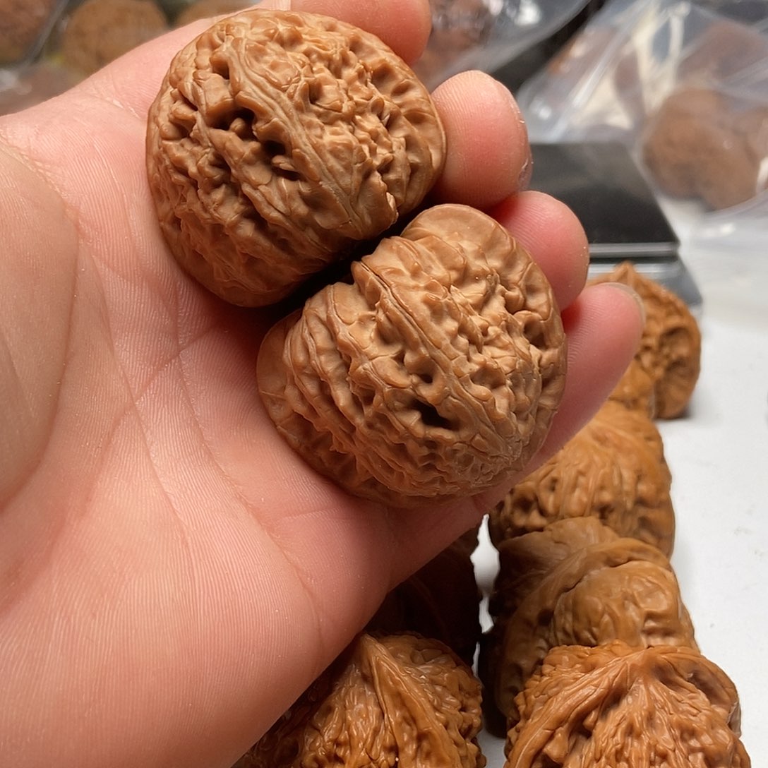 文玩核桃把件三角白