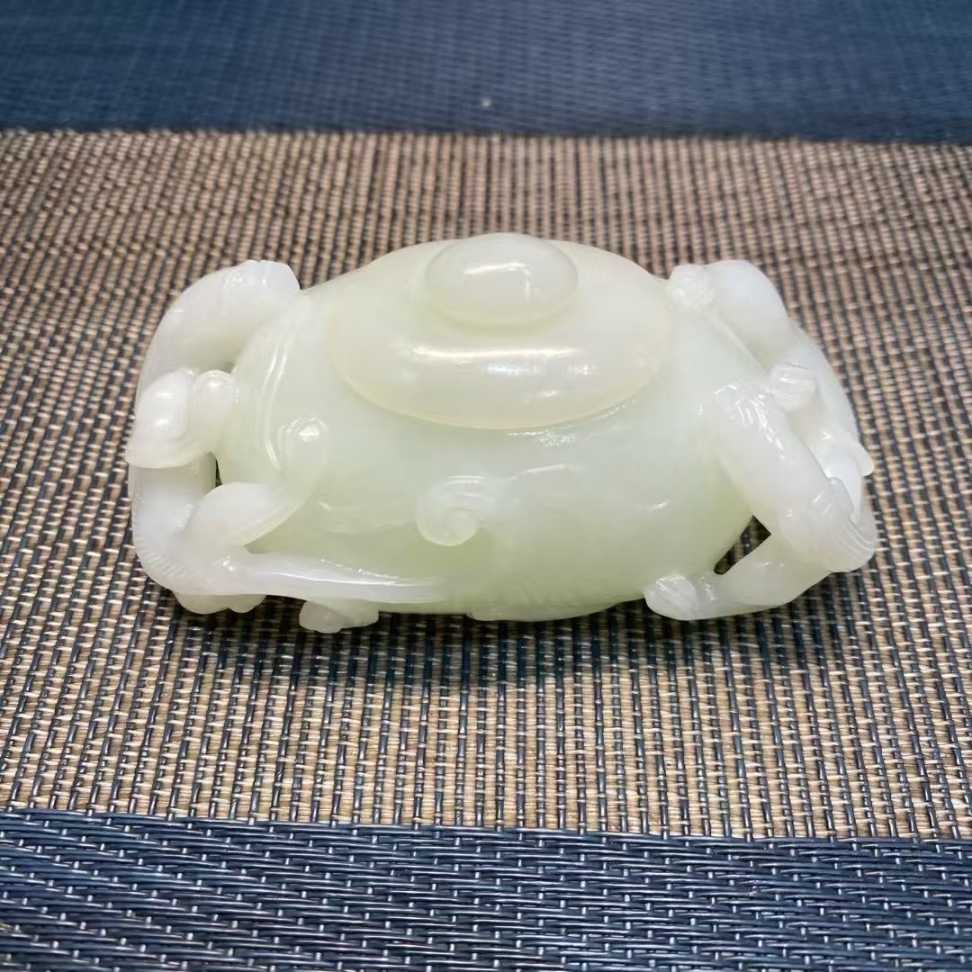 和田白玉手把件精美
