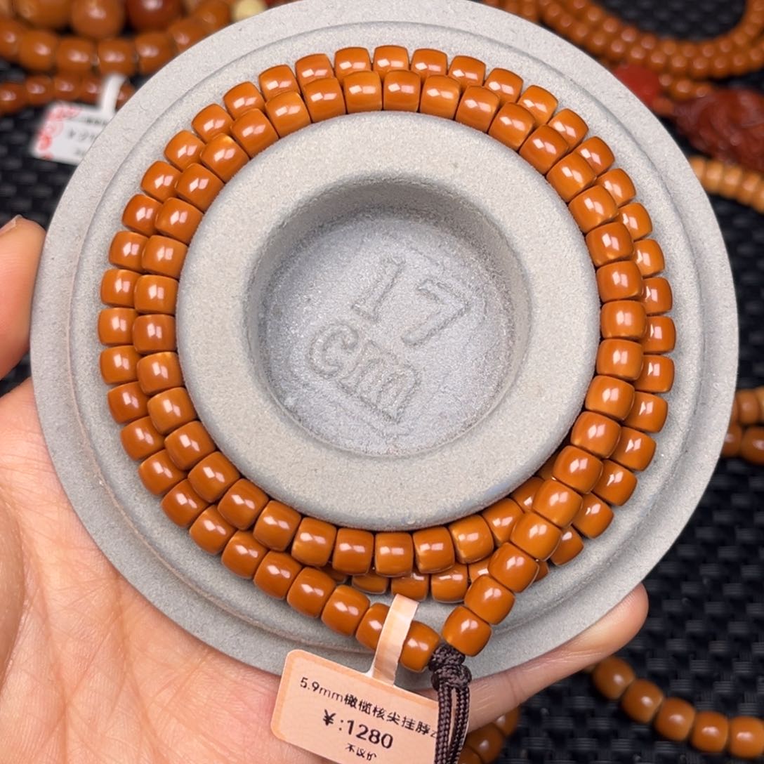 橄榄核其他我****.5.9mm橄榄核尖直切挂脖