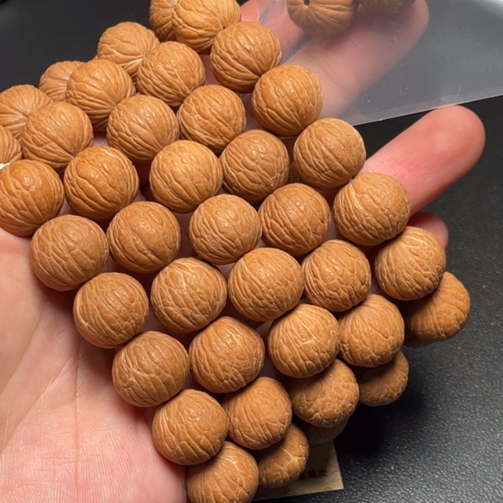 把件文玩核桃猴头凤羽16尺左右带俩备籽