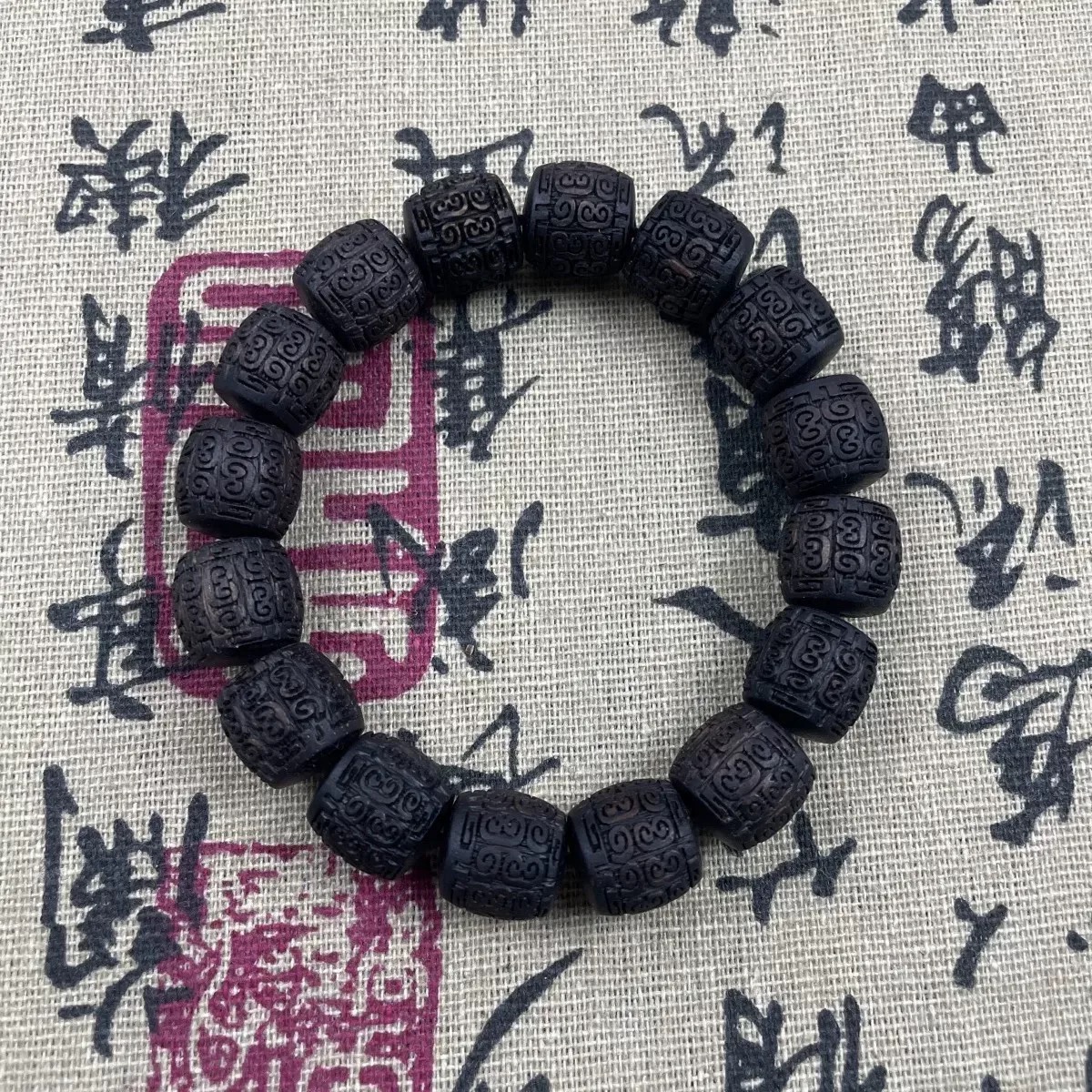 香沉木祥云文桶珠1.3*1.416颗(无礼盒)K167