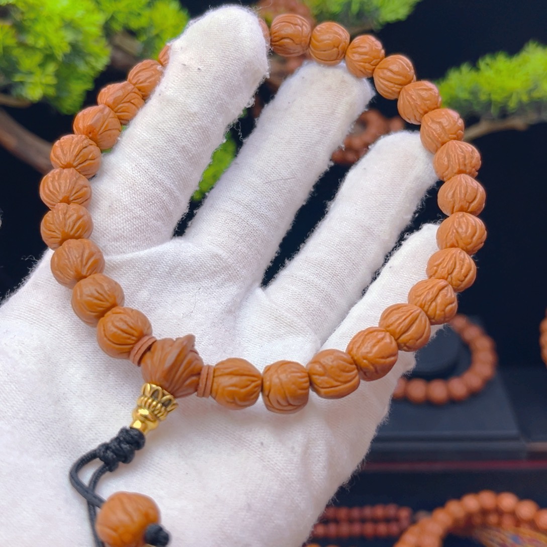 Q***。桃核吊坠野生桃核