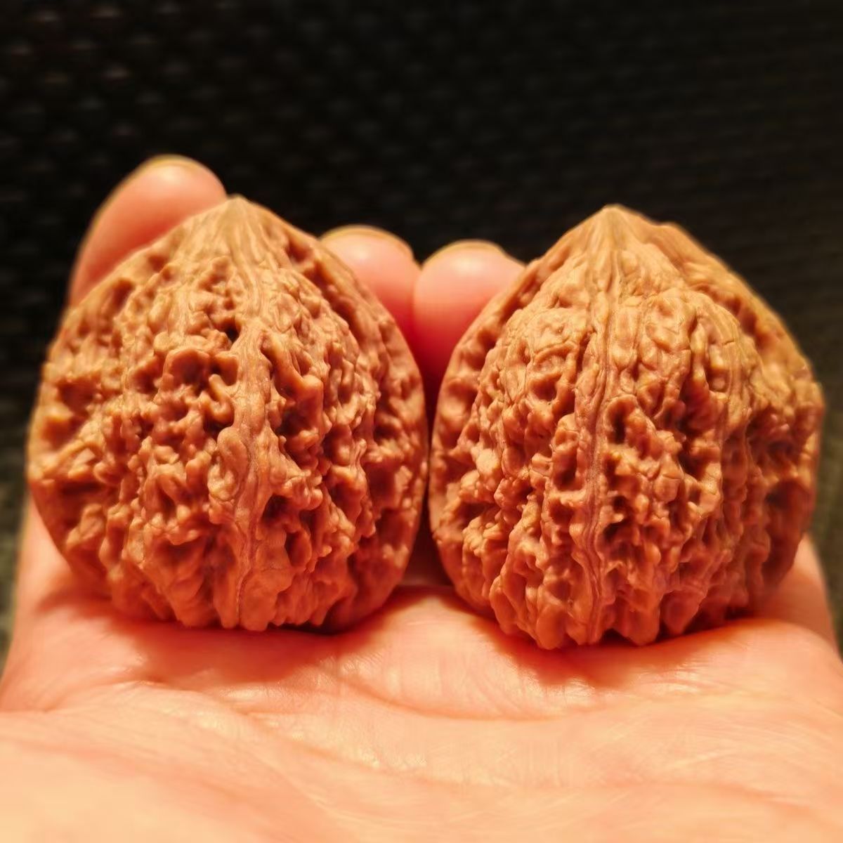 高炮南疆石文玩核桃手把件