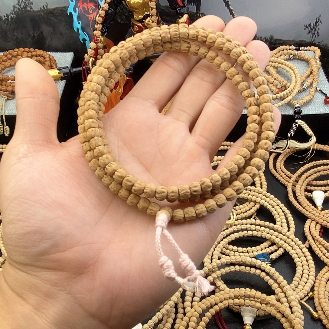 手串柏香籽/百香籽C****桃