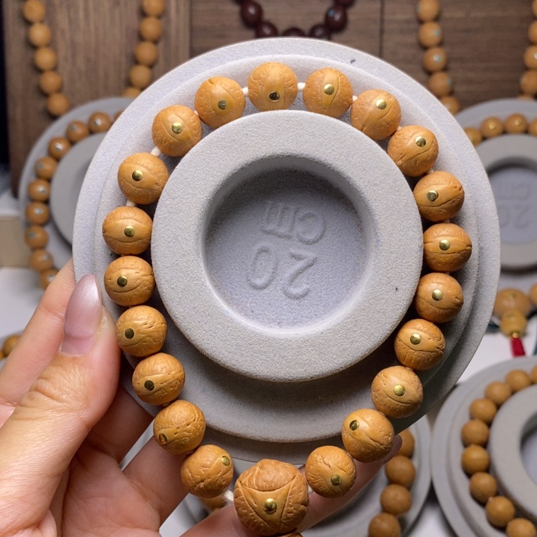 吊坠凤眼菩提12铜钉串