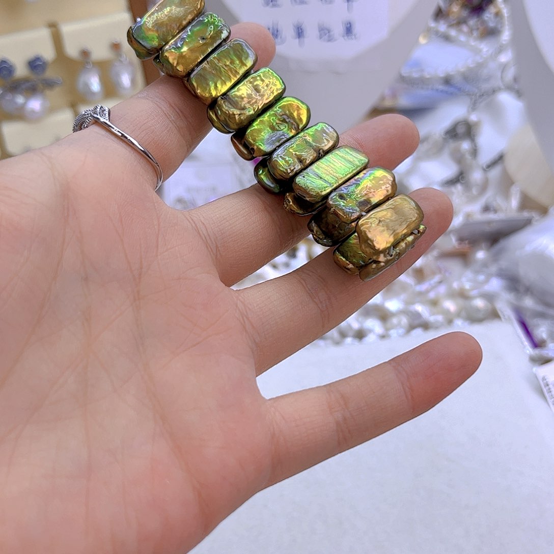 紫***紫银S925镶嵌淡水珍珠970