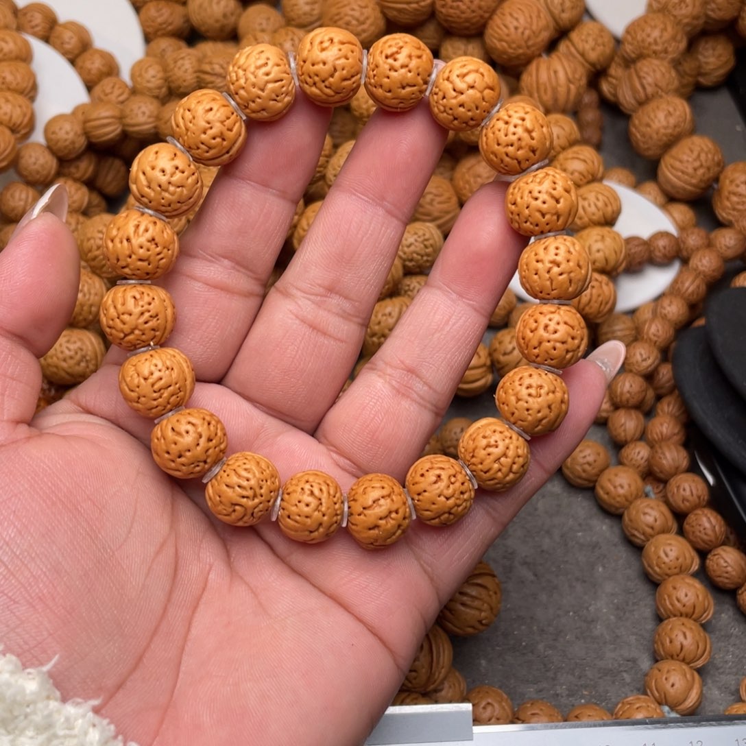 米***基桃核手串高山奶豆闪75