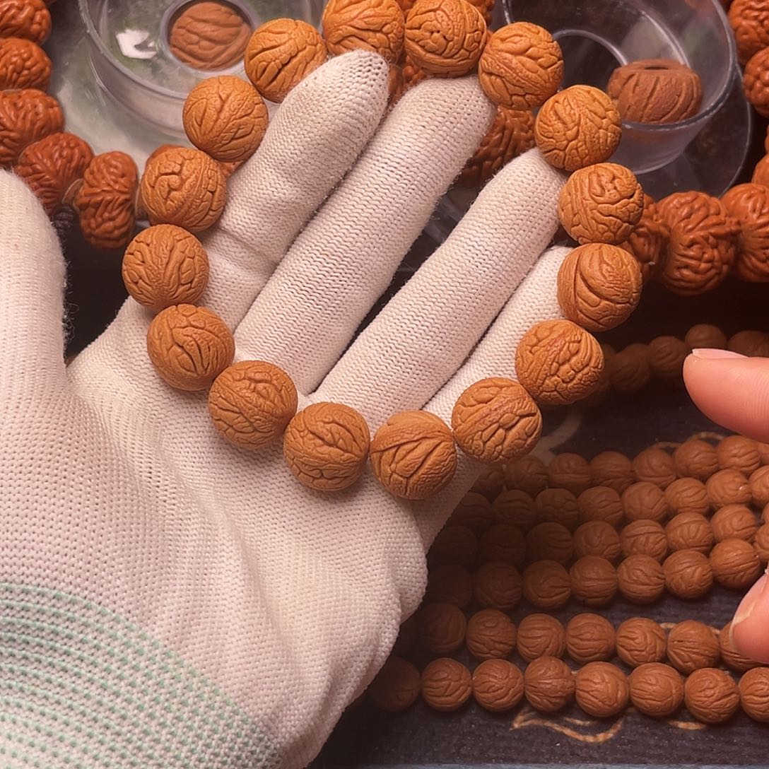 手串桃核金丝龙珠1.5