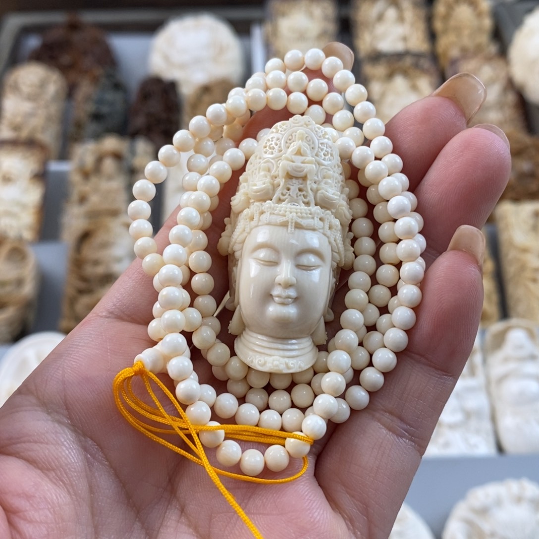 杨****猛犸象牙吊坠七宝佛套装