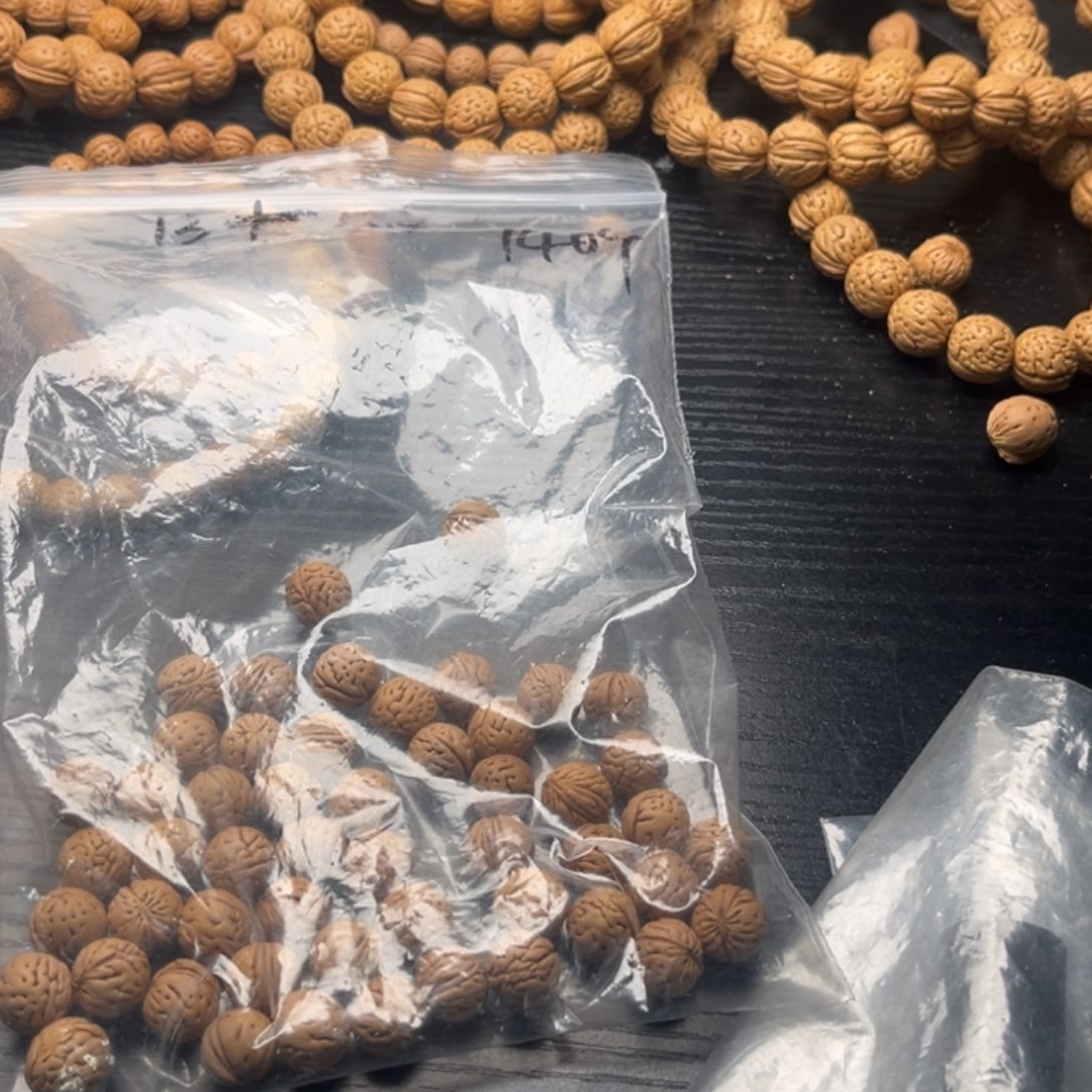 炎***阳文玩核桃吊坠小桃核