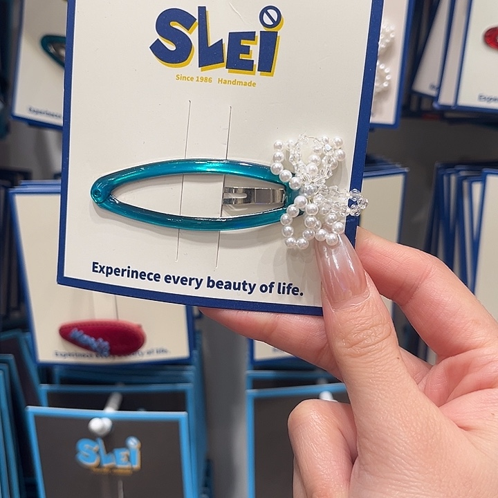 布艺铁合金珍珠蓝色拜拜夹