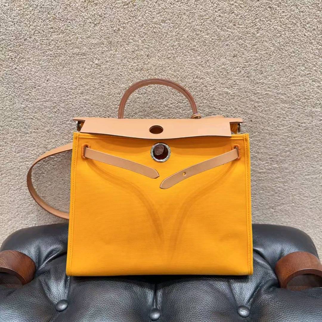 99新 Hermes/爱马仕 爱马仕/HERMES herbag31 橙色帆布拼皮银扣