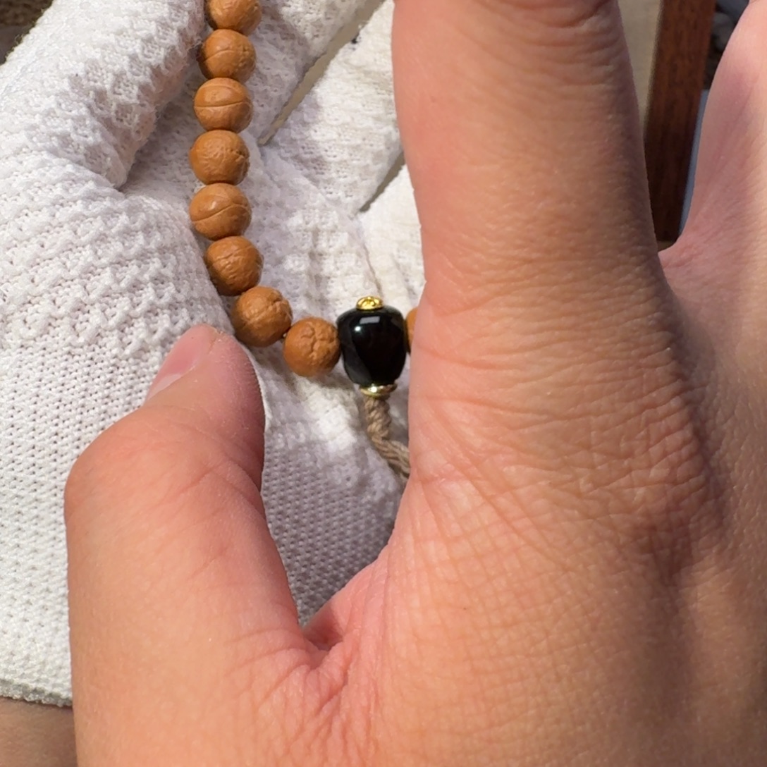 文玩核桃吊坠凤眼