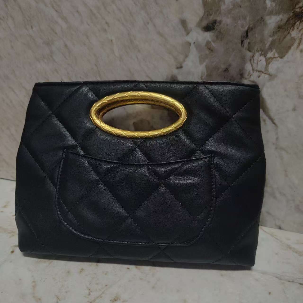 YNPO24年秋冬新款真皮重工女包椭圆黑色