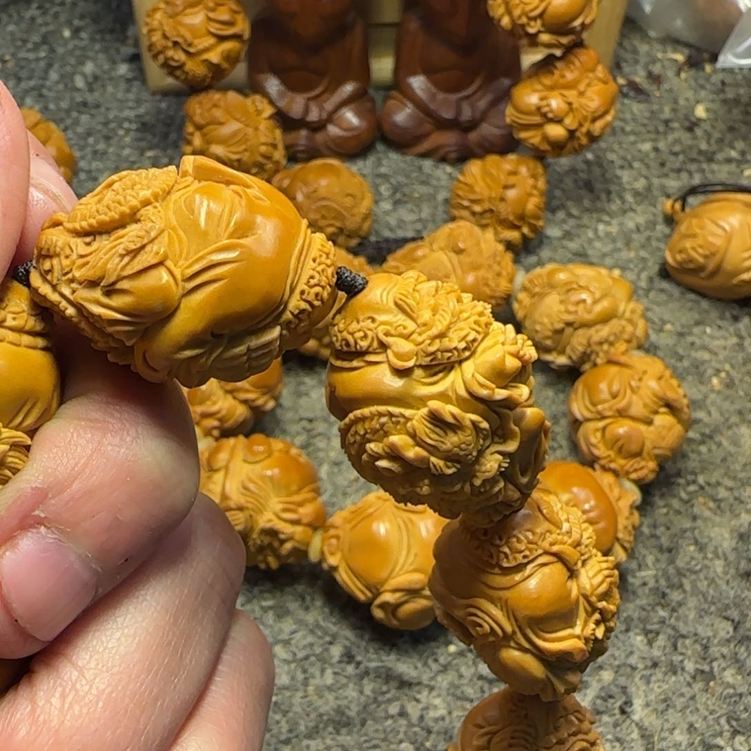 橄榄核吊坠胖****°……………………