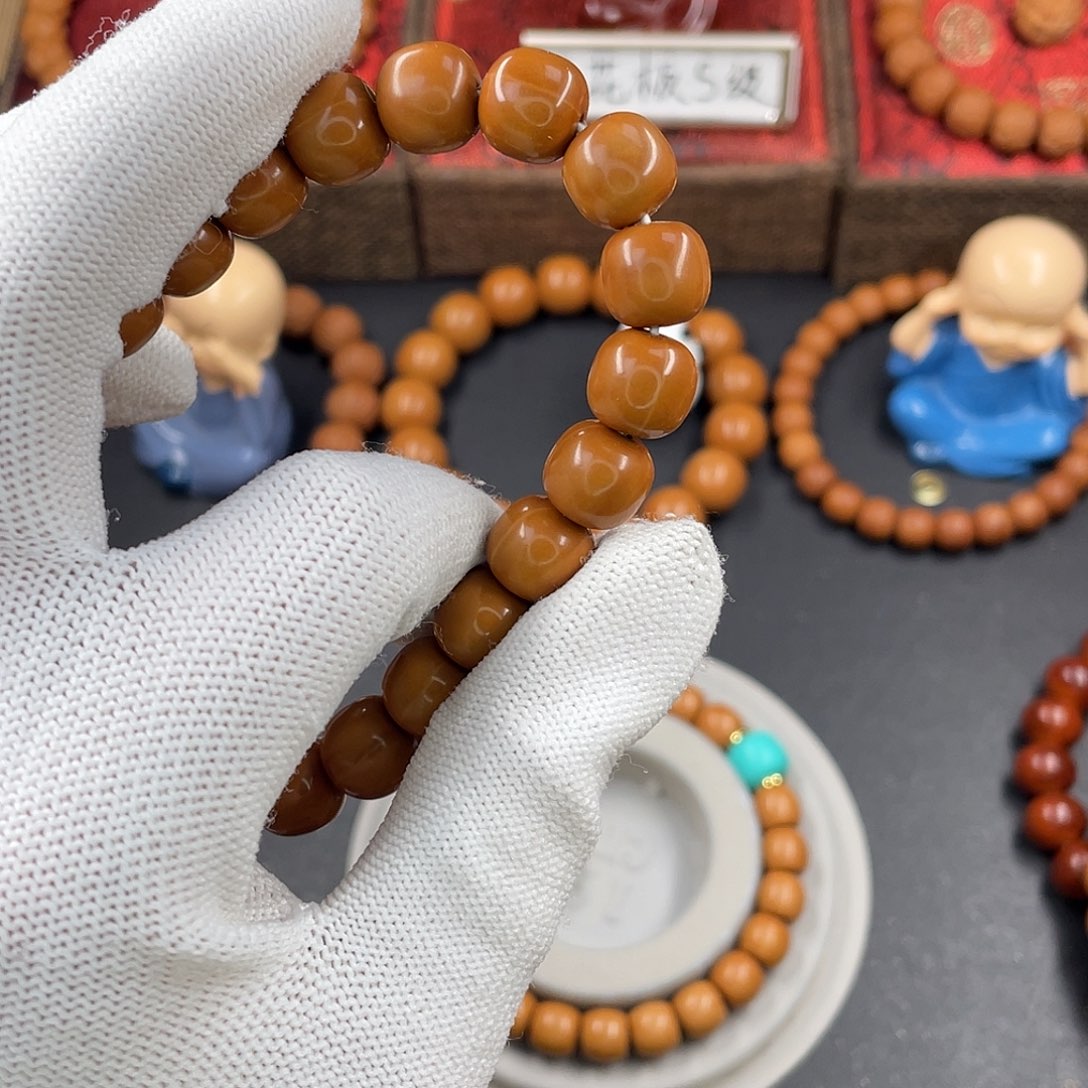 猴头核桃手串小**跑10.8龙炎S