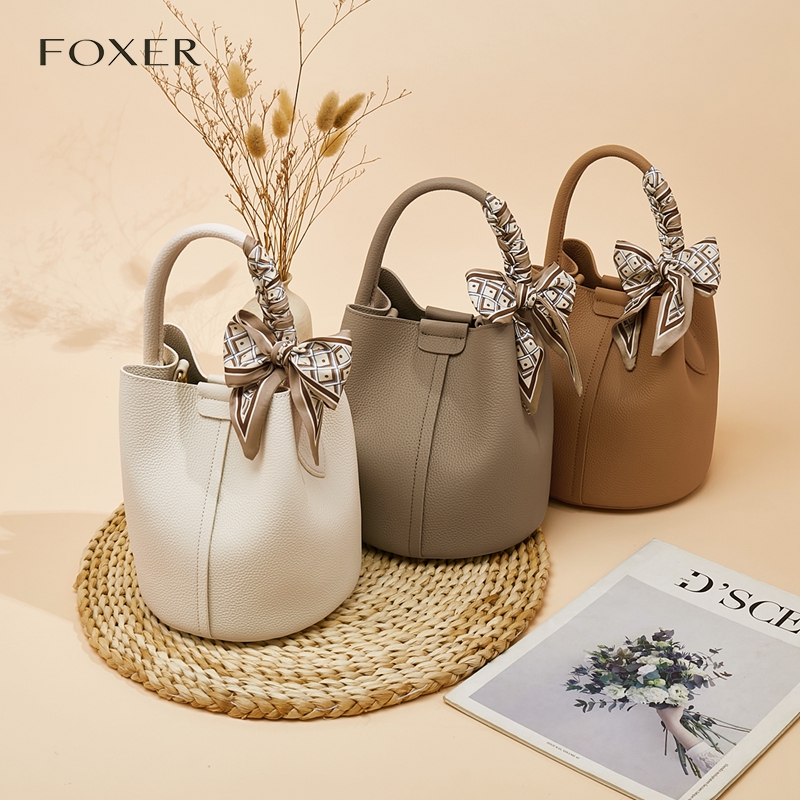 双根扣式水桶包磁扣单肩包女士斜挎包轻奢百搭小众