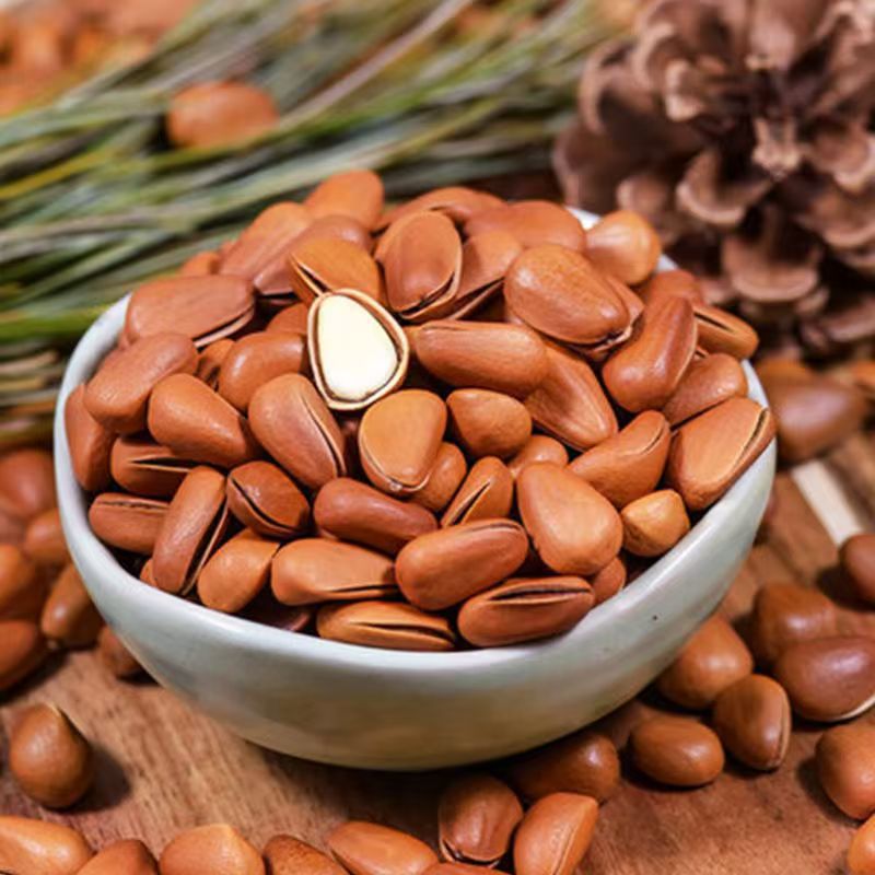 新货松子手剥开口红松子散装坚果零食干果休闲小零食净重500g