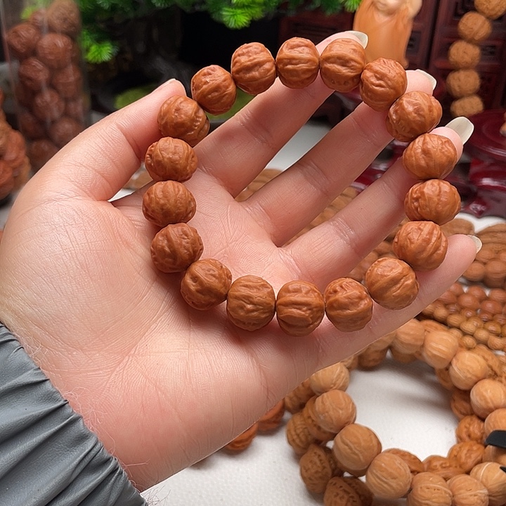谜***！桃核手串粗筋小方度