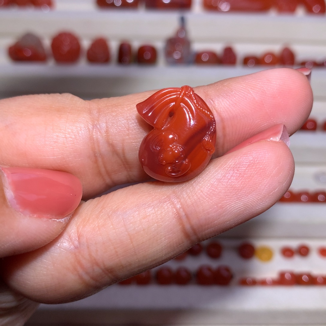 南红玛瑙未镶嵌福袋柿子玫红