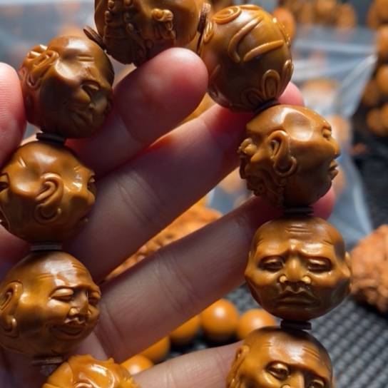 橄榄核吊坠请***哥须派罗汉
