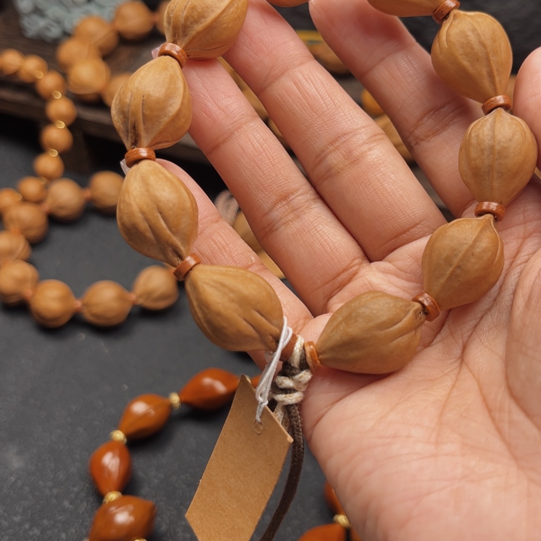 菁***客橄榄核手串16.24三面佛梅林铁核