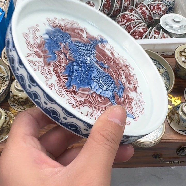 瓷片釉里红麒麟踏浪大壶乘