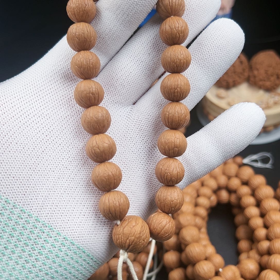 余***温猴头核桃手串凤羽