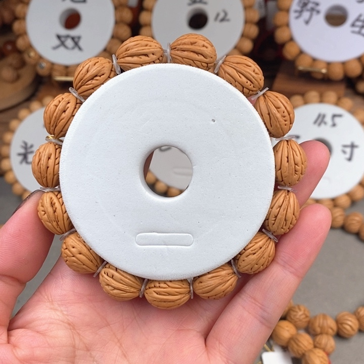 桃核手串钱袋儿12.5尺寸误差0.5之间