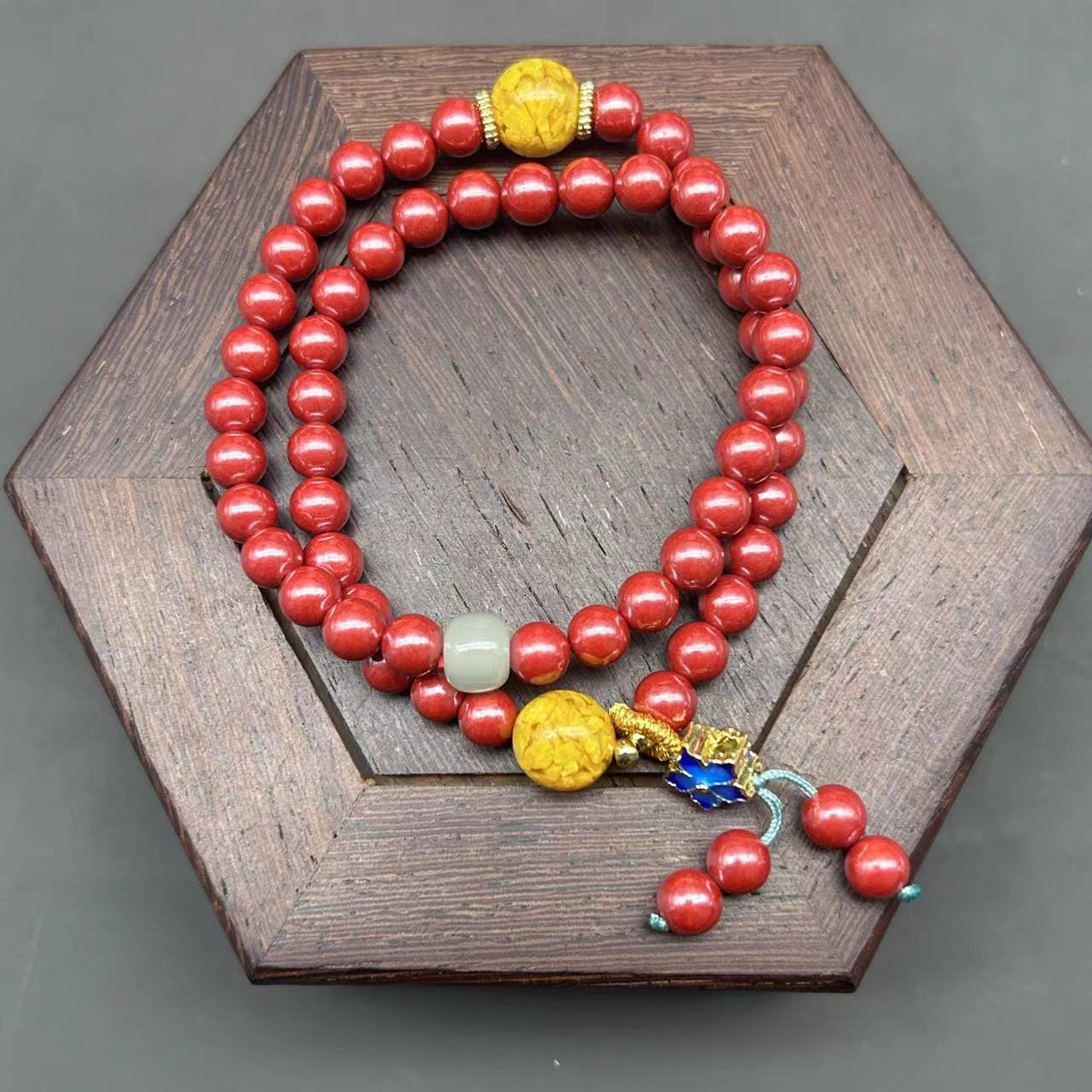 含辰砂工艺品含辰砂工艺品DW417帝王黄白配珠花提溜双圈手串6mm