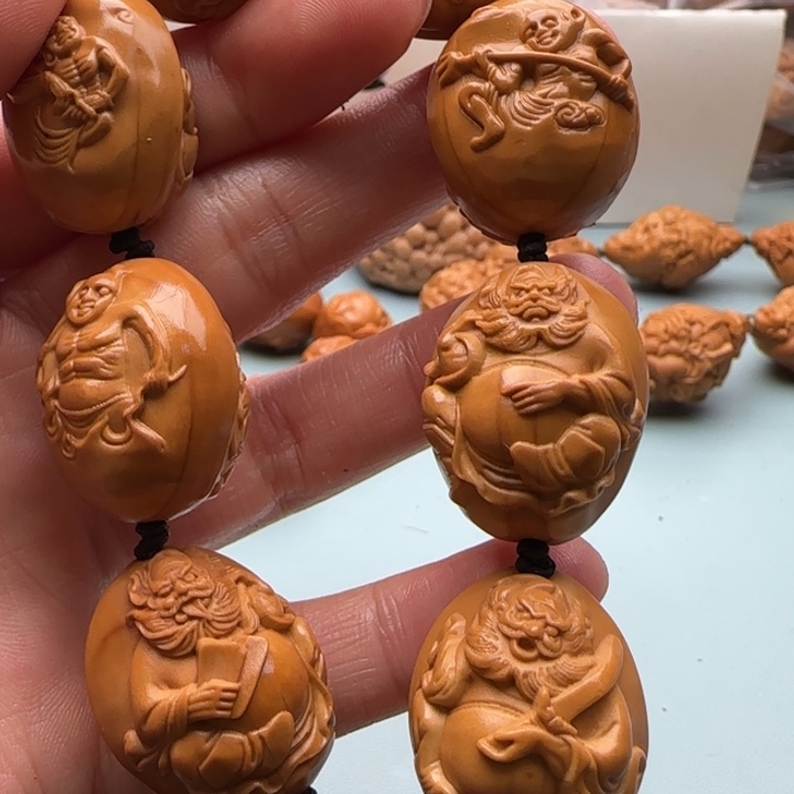 橄榄核手串雕刻工艺