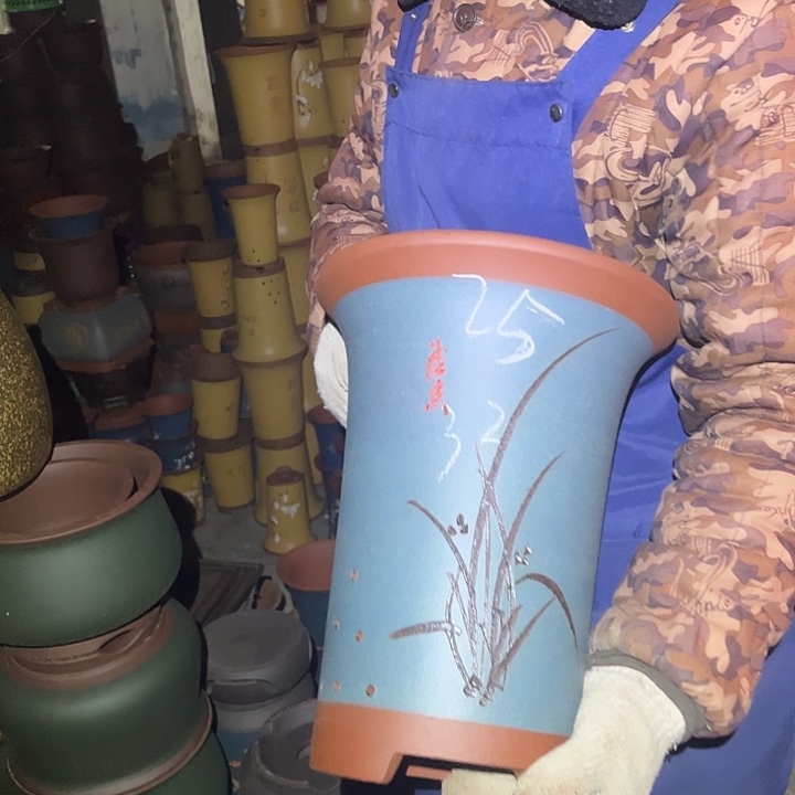 紫砂花盆紫砂花盆是指利用