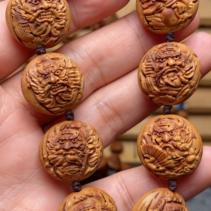桃核雕刻钟馗手串