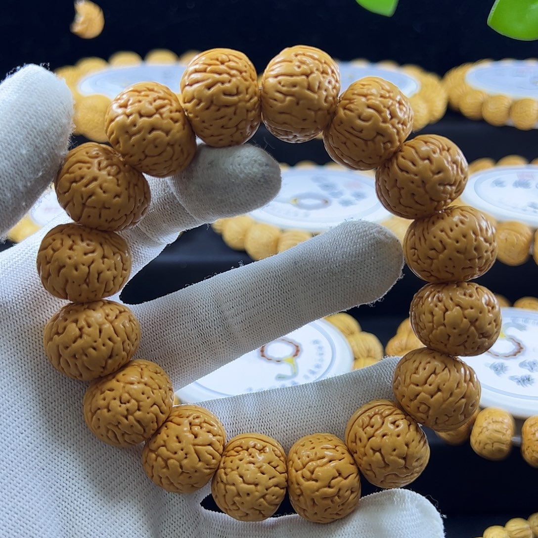 信***己手串桃核苹果园桃核手串