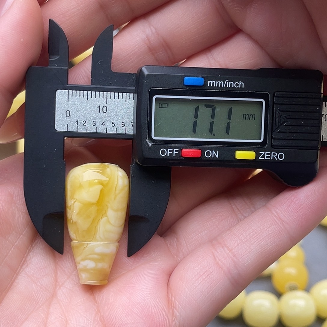 琥珀未镶嵌裸石蜜蜡三通梦金白飘花