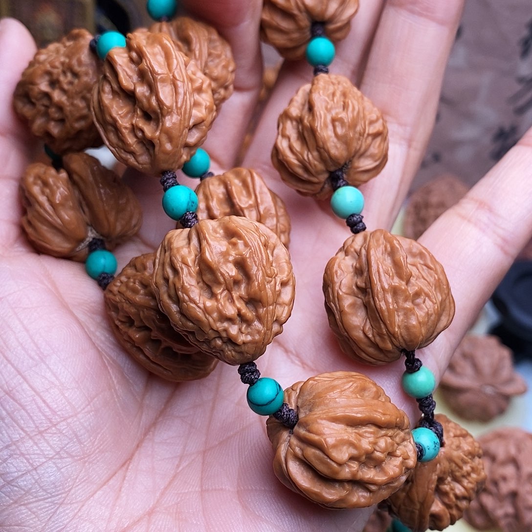 哈***3吊坠文玩核桃22白狮子串