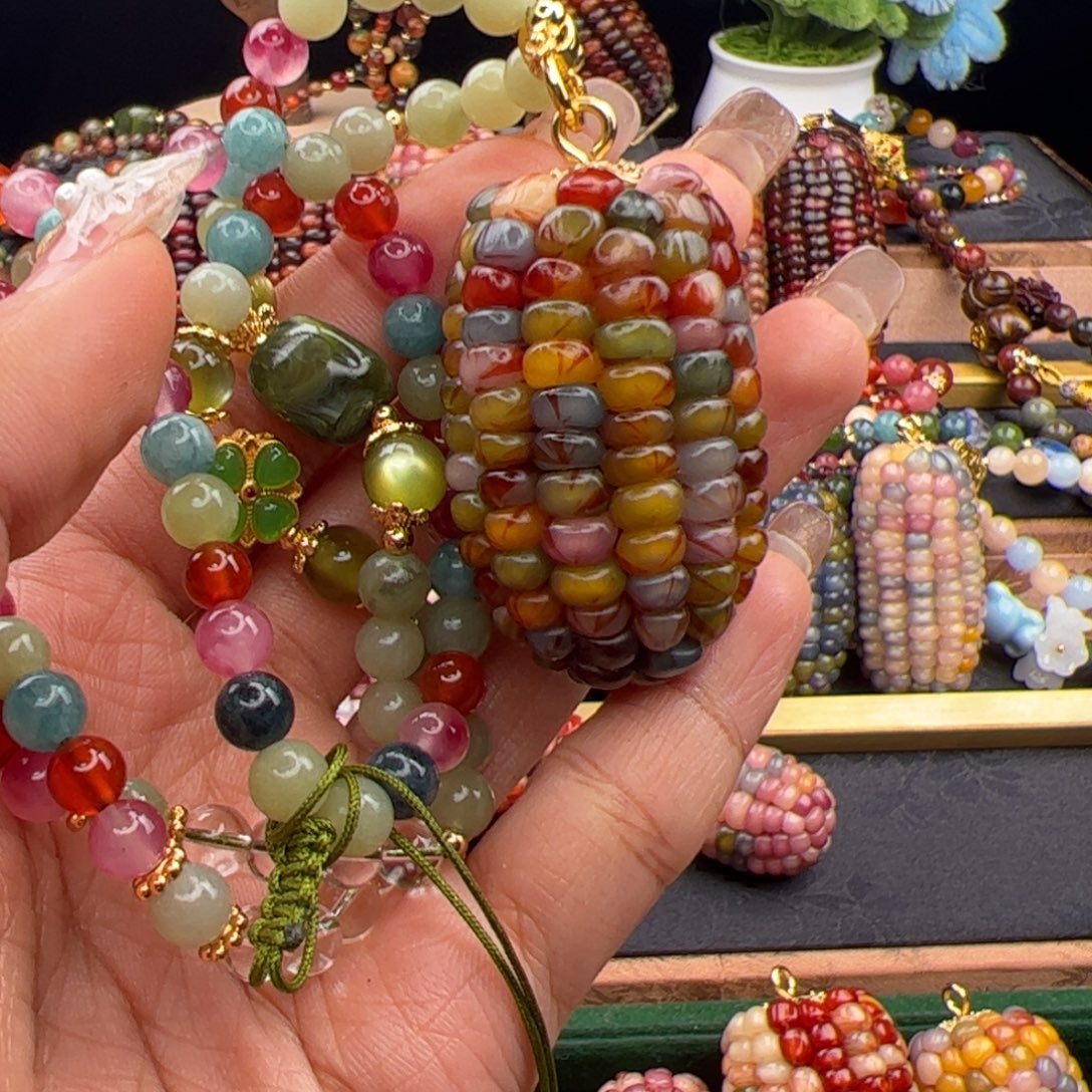 雁****非金属七彩文玩玉米专拍链接