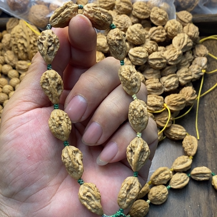 卤***虎文玩核桃吊坠文玩木质核桃手串